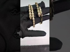 Serpenti Viper one-coil 18 kt yellow gold bracelet set with pavé diamonds on the head and tail