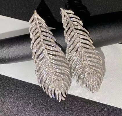  Plume De Paon Large earrings 18k white gold and round diamonds starting a luxury jewelry business